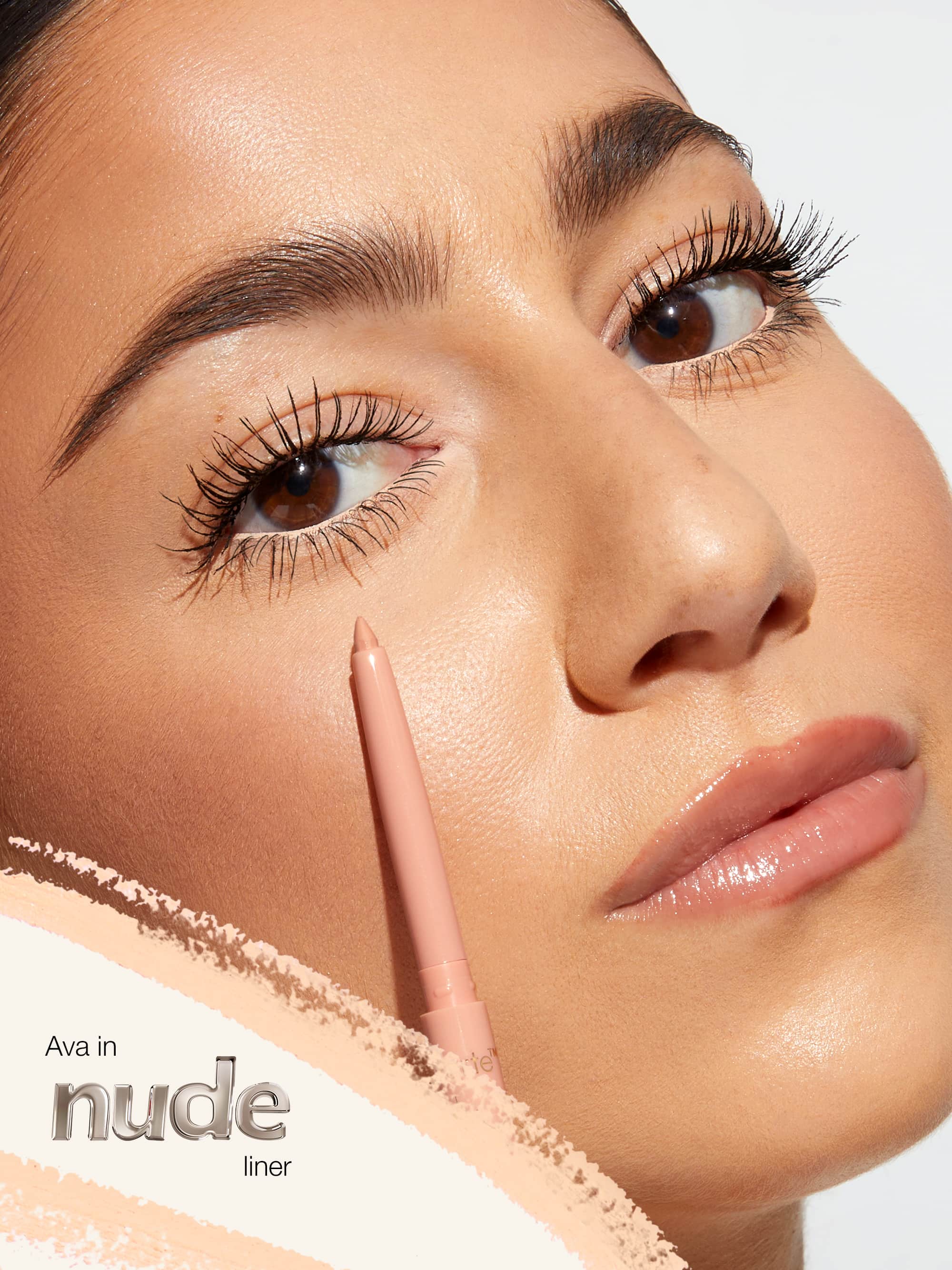 Close-up of a woman's face wearing tarte fake awake labeled 'Ava in nude liner'.