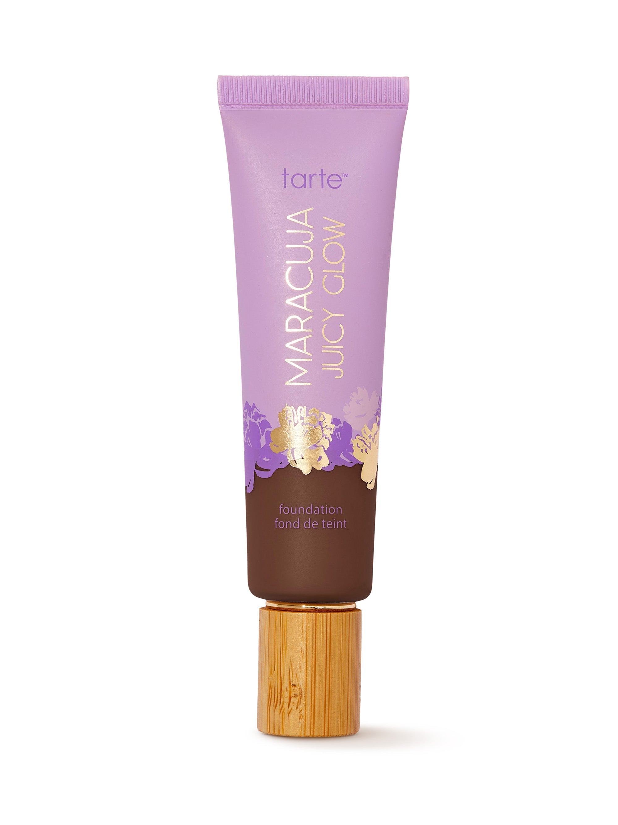 Tarte Maracuja Juicy Glow foundation tube with purple cap on a white background