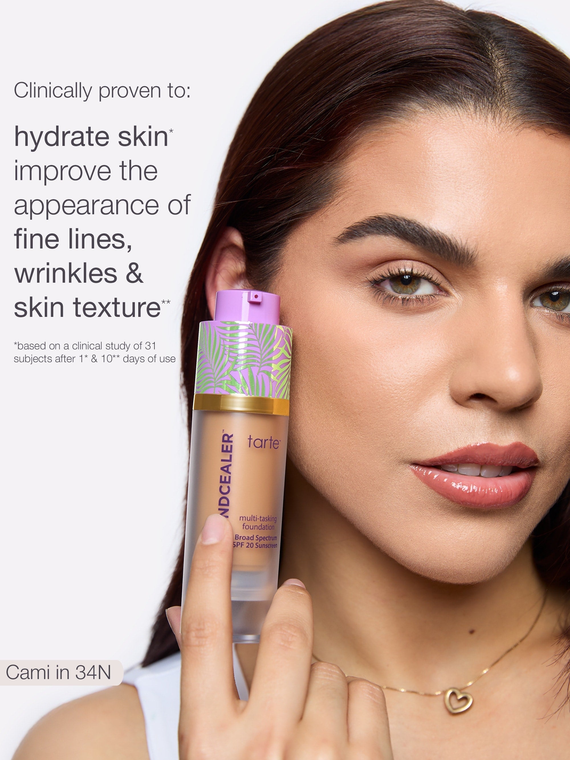 Woman holding a bottle of tarte concealer with text about skincare benefits.