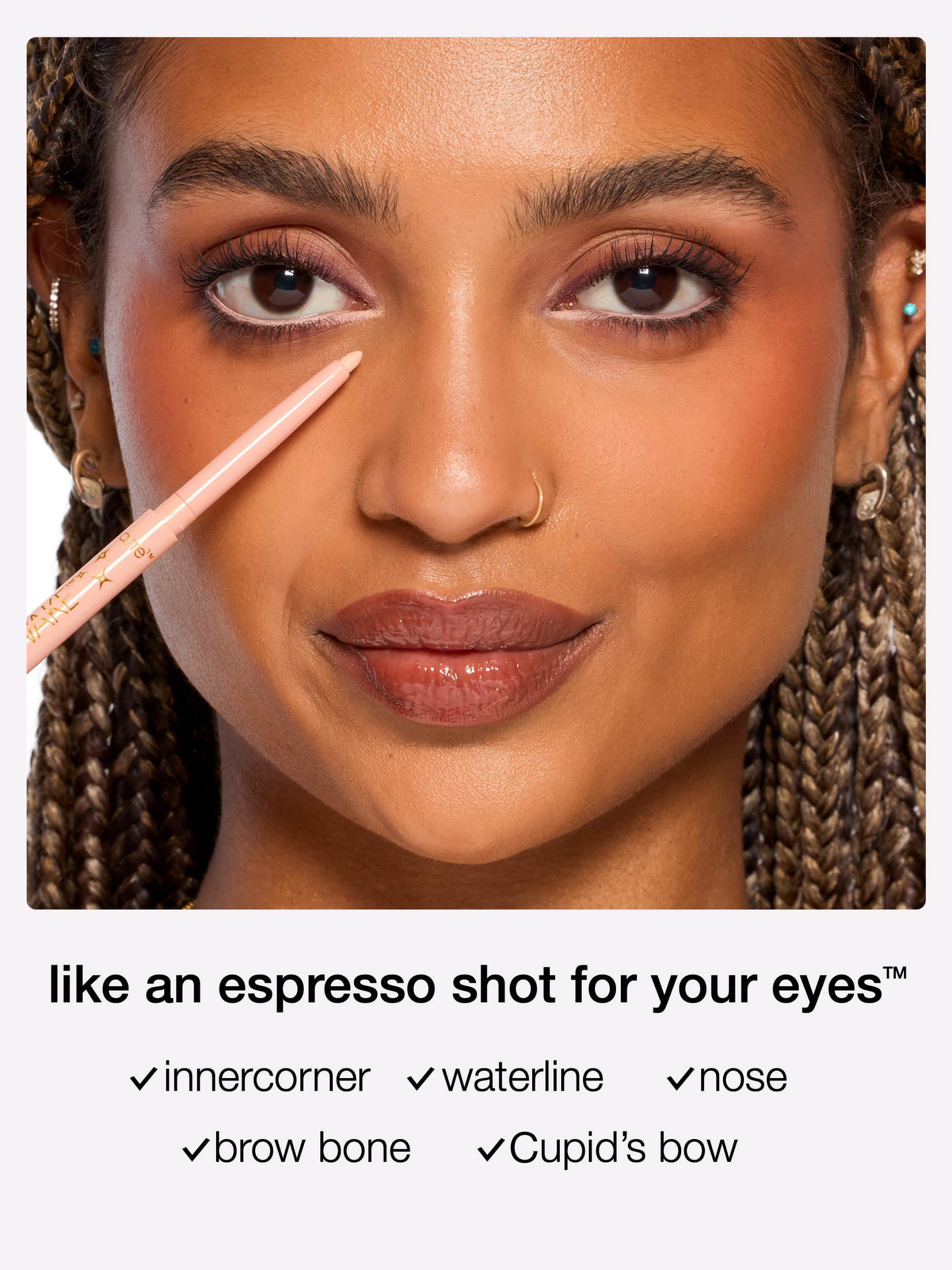 Close-up of a woman's face with tarte fake awake application tools and text overlay.